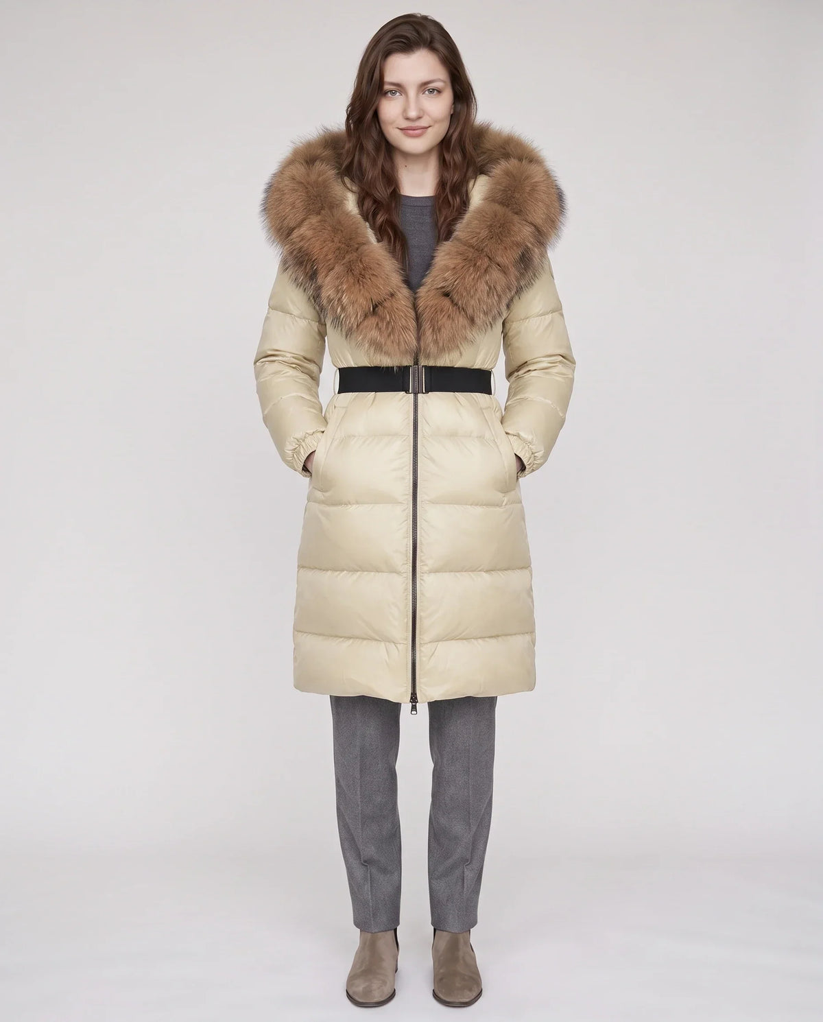 Long belted puffer jacket with a faux fur hood