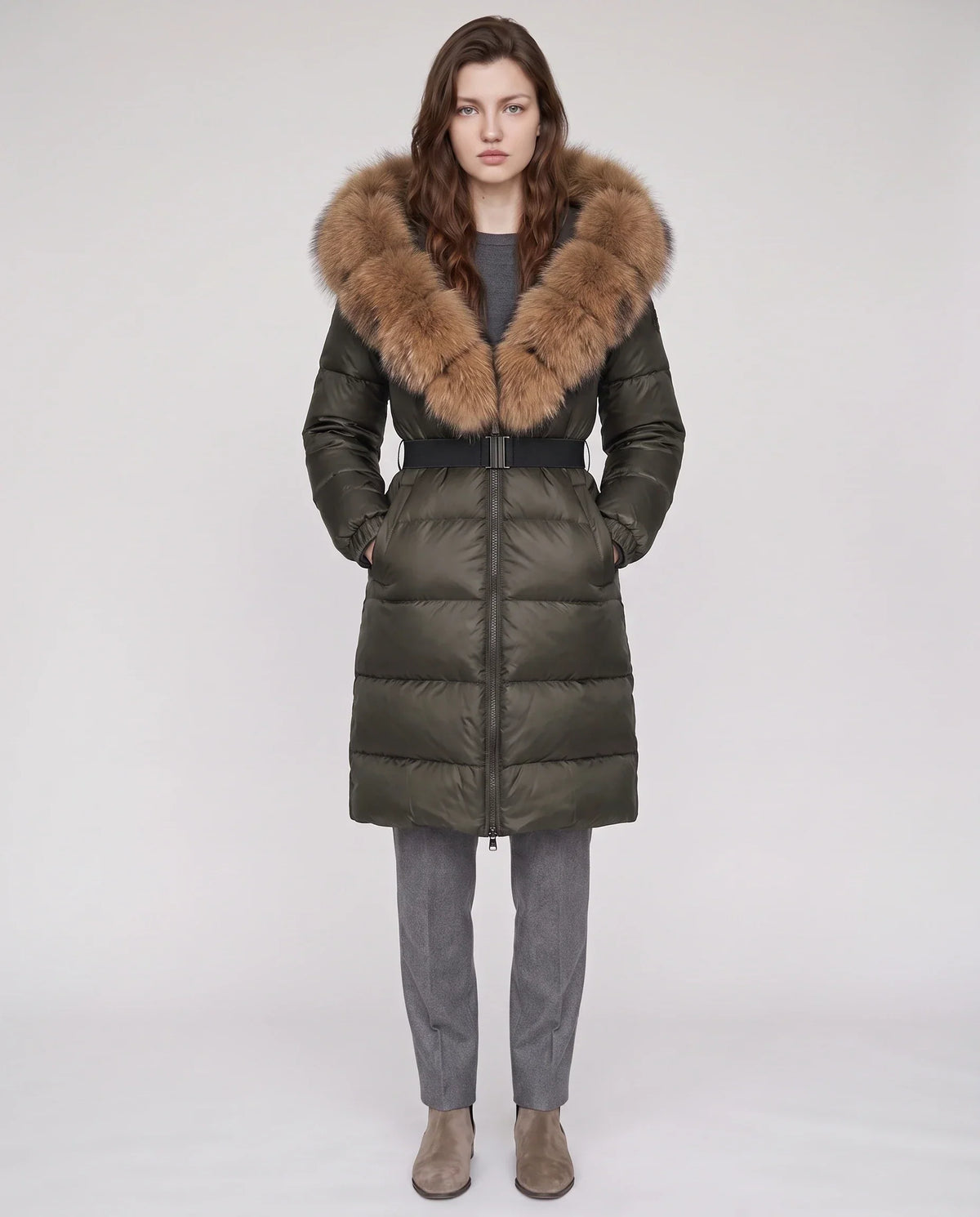 Long belted puffer jacket with a faux fur hood