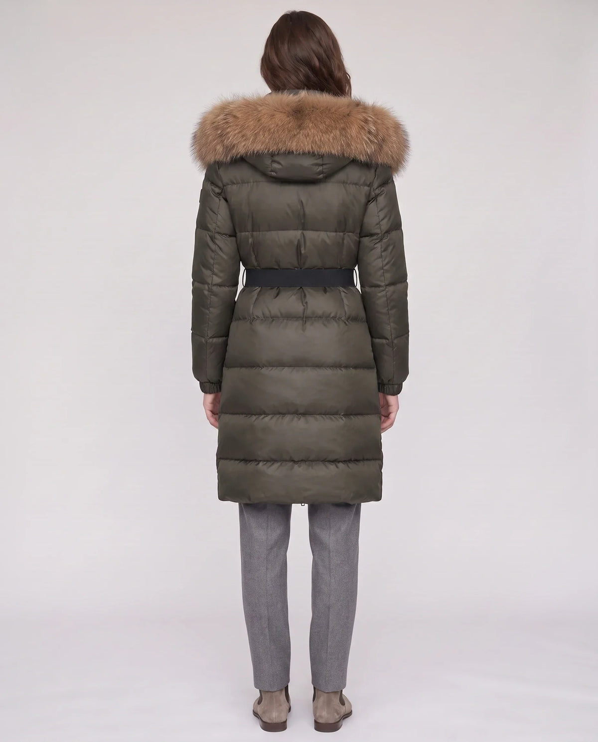 Long belted puffer jacket with a faux fur hood