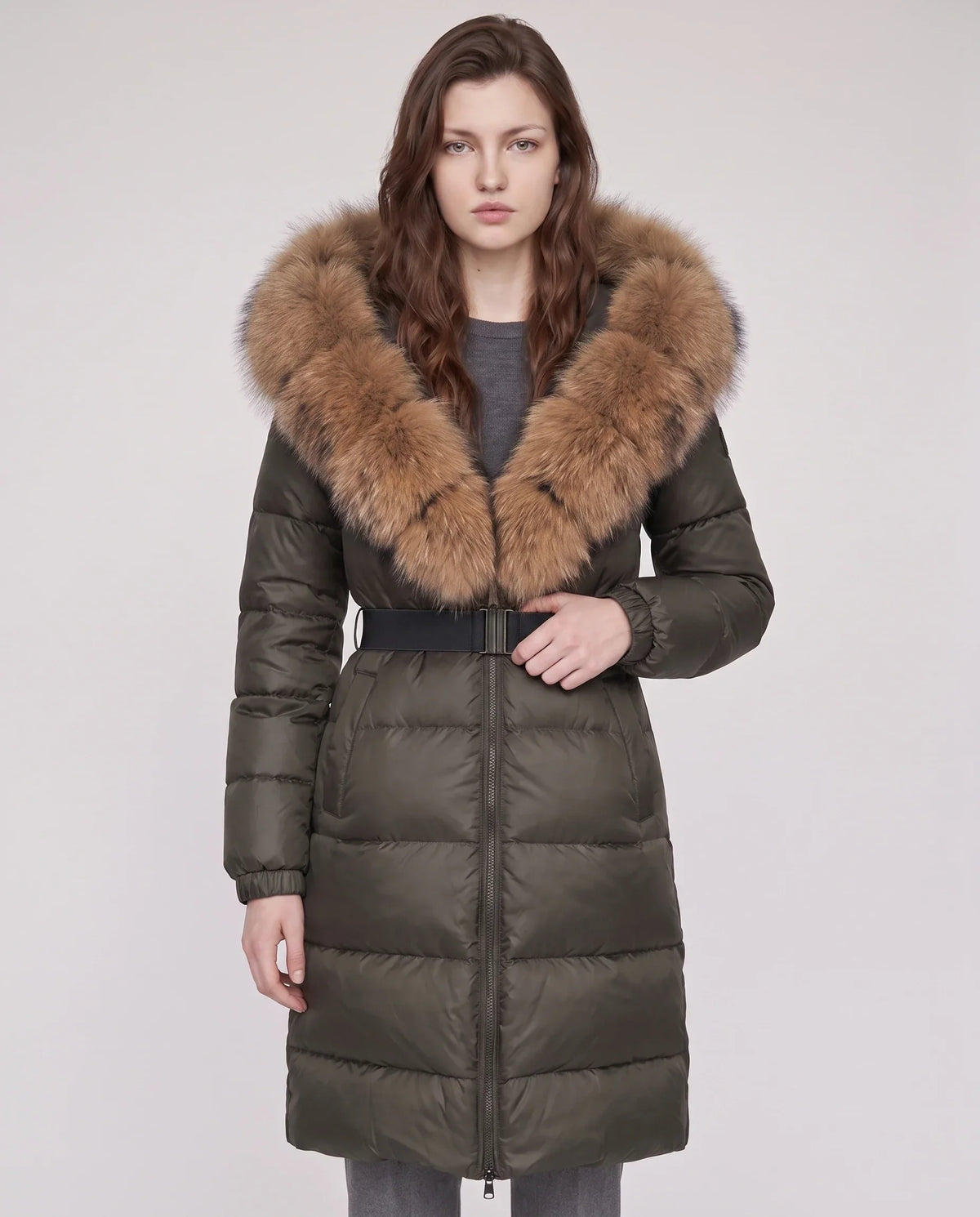 Long belted puffer jacket with a faux fur hood