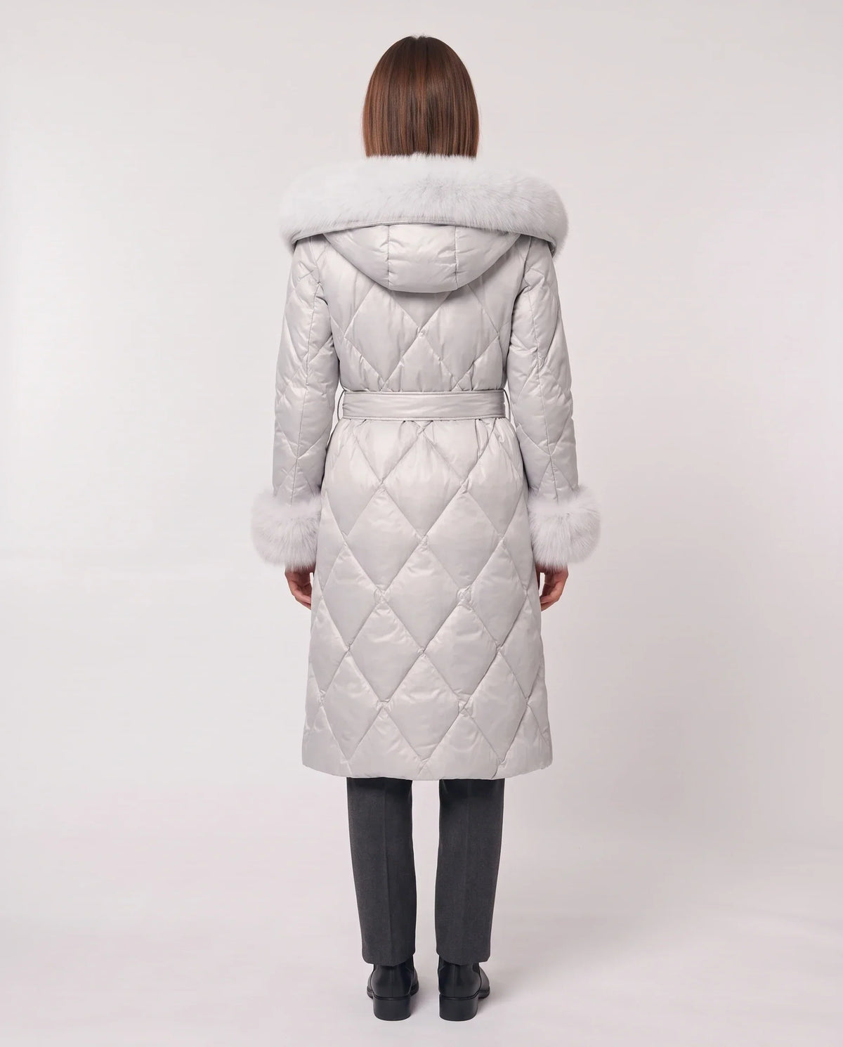 Long wrap-style puffer jacket with a fur-trimmed hood