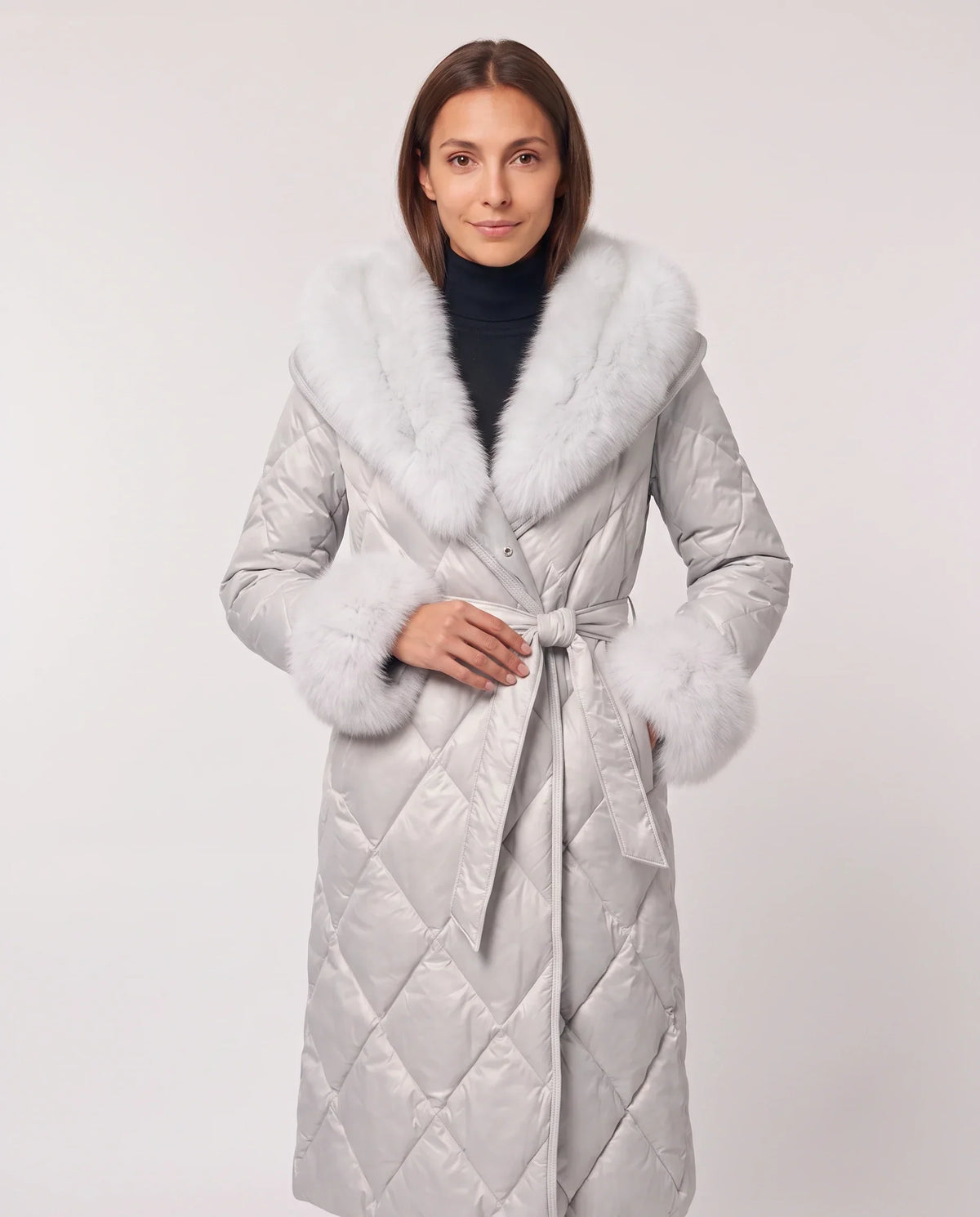 Long wrap-style puffer jacket with a fur-trimmed hood